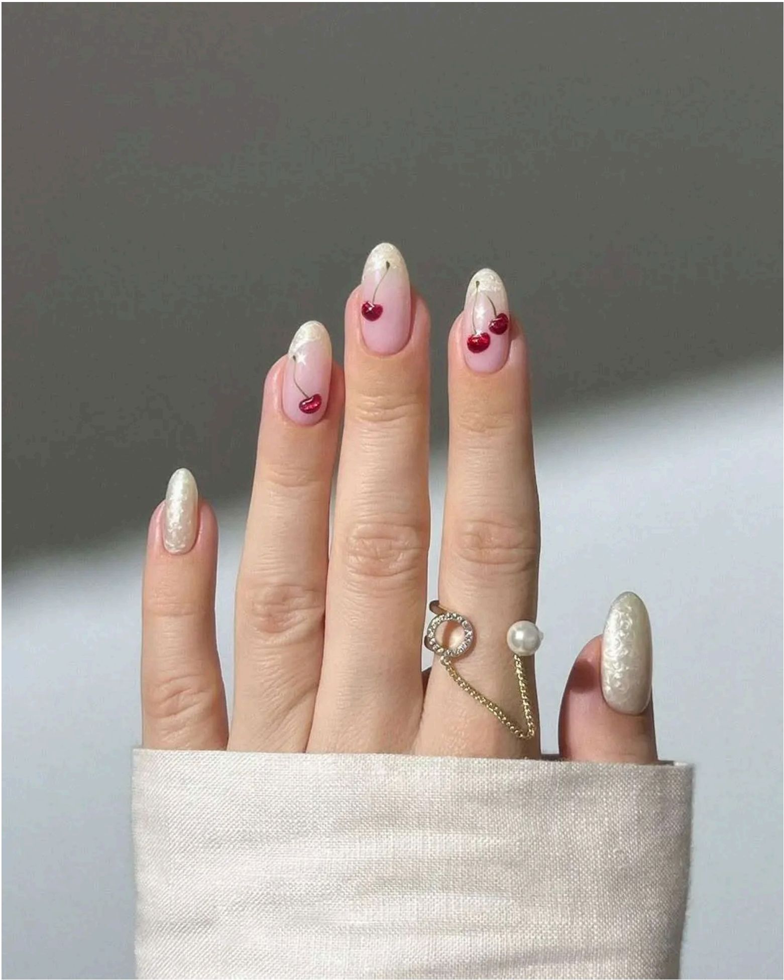 Sweet pink base with pearly white tips and delicate cherry art – fresh and fruity beach fun.