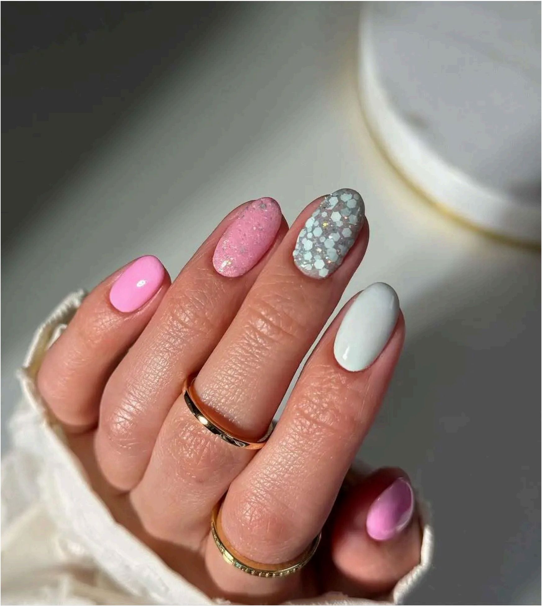 Baby pink, sparkly pink, blue shimmery hex glitter, and white create perfect beachy pastels.