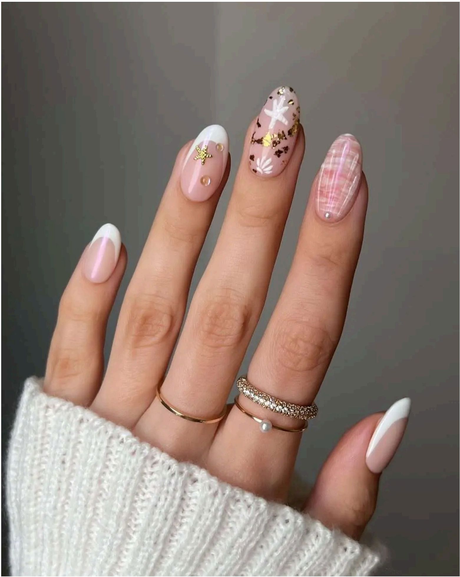 Coastal-inspired designs that turn your fingers into ocean treasures.